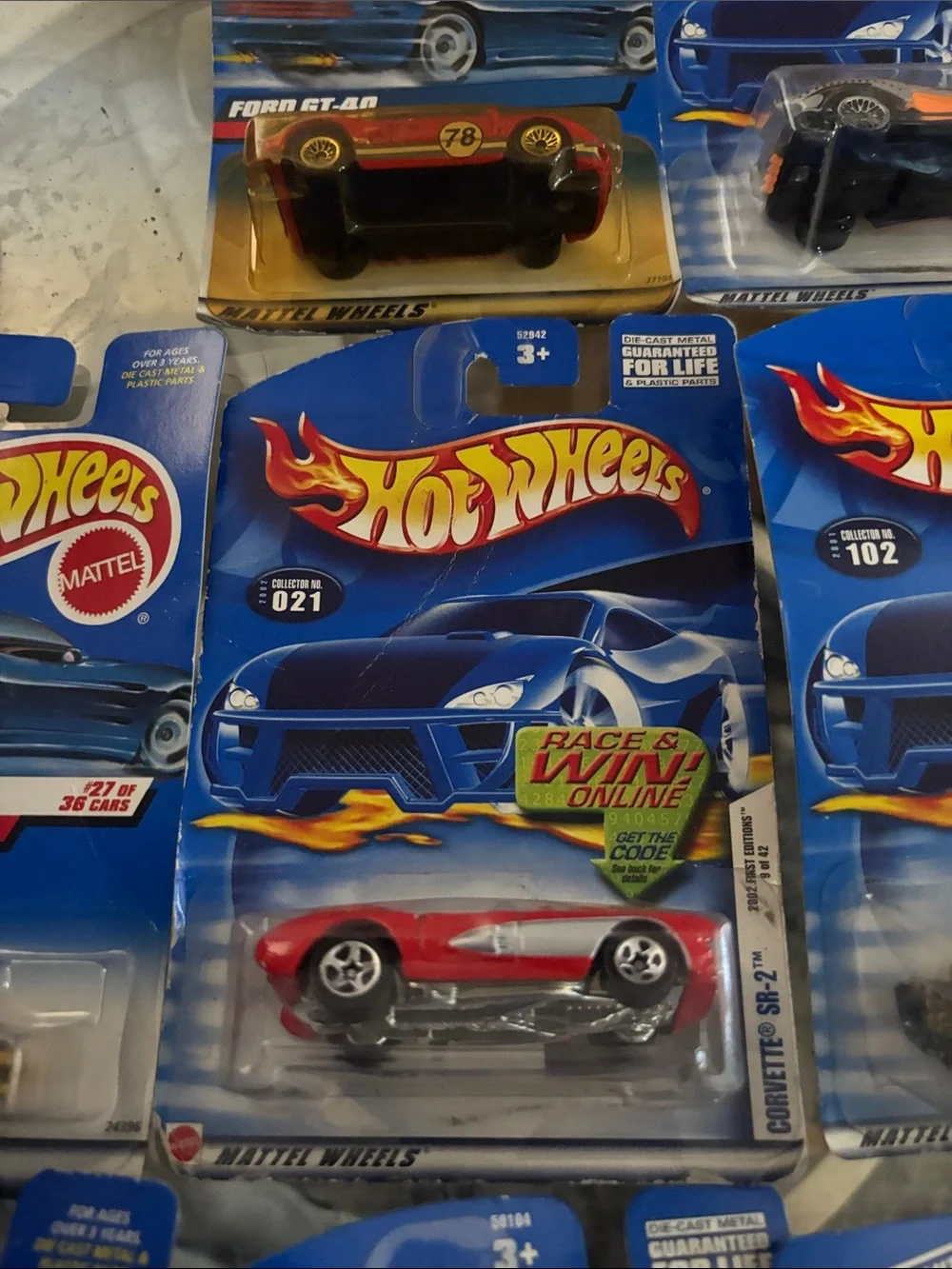 10 Hot Wheels cars in packaging